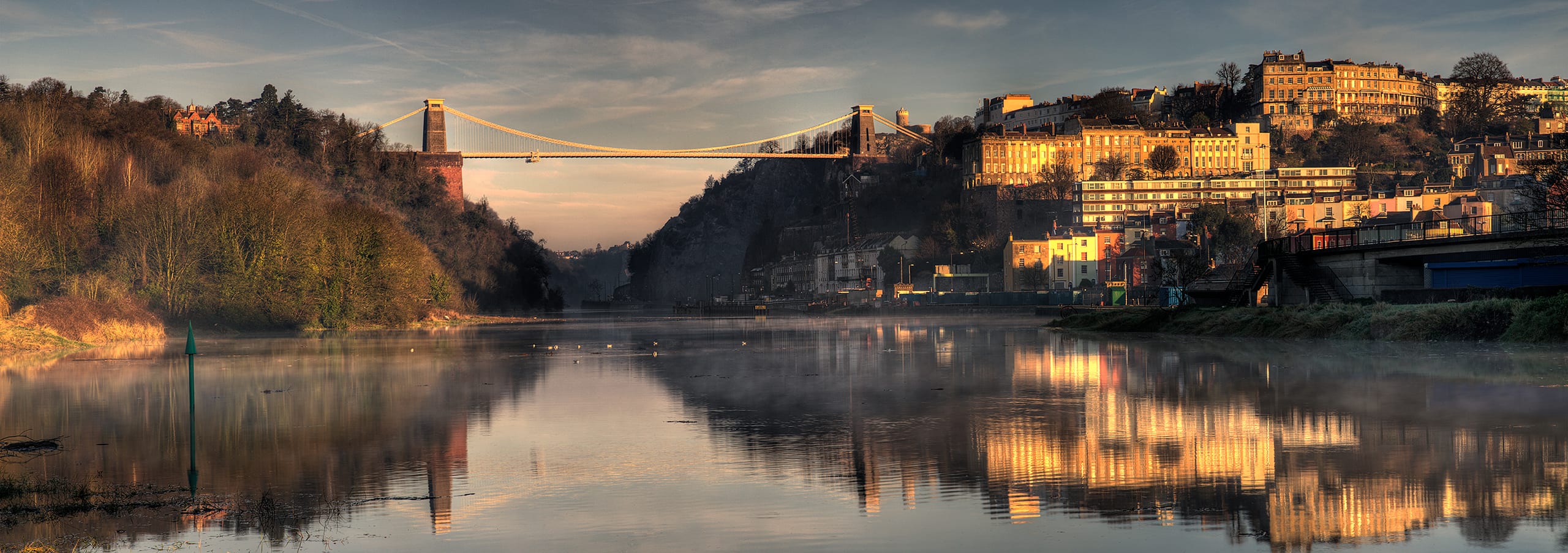 The Clifton Suspension Bridge above the Avon Gorge at first light, Bristol.